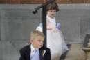 To children at wedding looking cute.